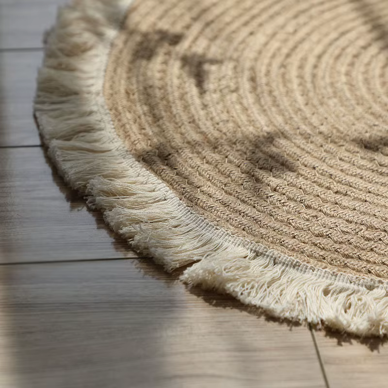 Tapis rond en rotin de jute tissé à la main avec pompon