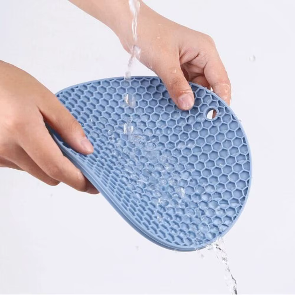 Tapis de protection en silicone résistant à la chaleur pour casseroles