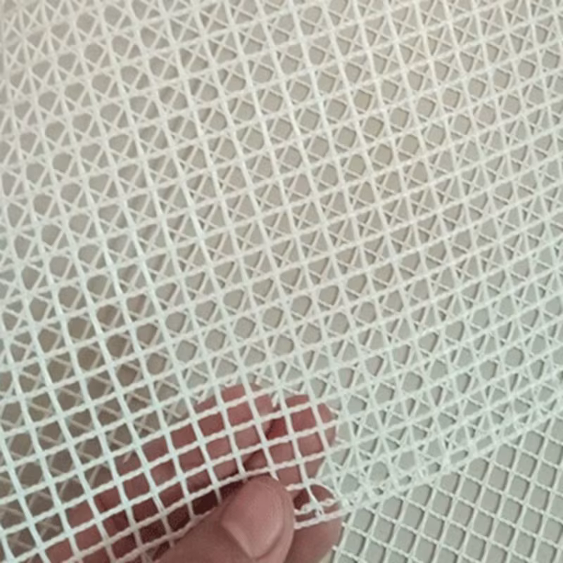 Toile de maille d'accrochage de tapis vierge