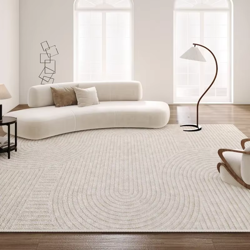 Tapis de grande surface beige à motif géométrique