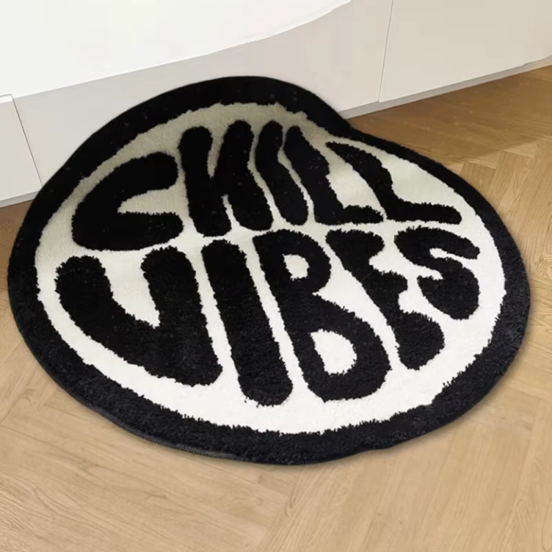 Tapis de sol créatif rond rayé noir et blanc VIKAMA