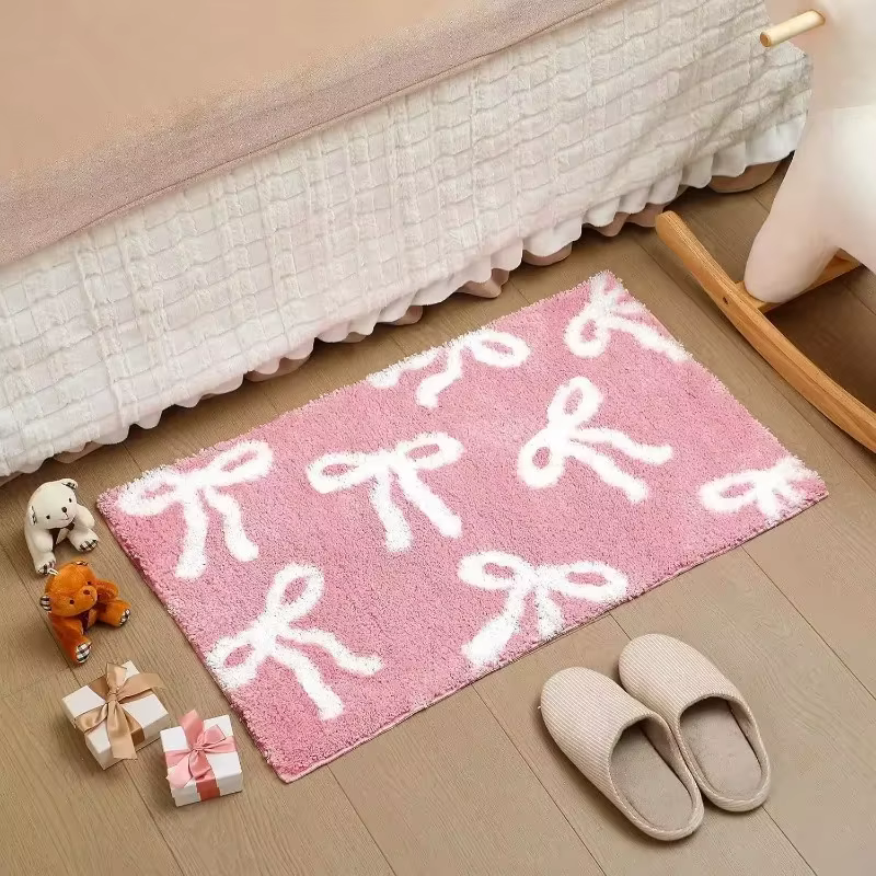 Tapis de bain rose avec nœud papillon VIKAMA
