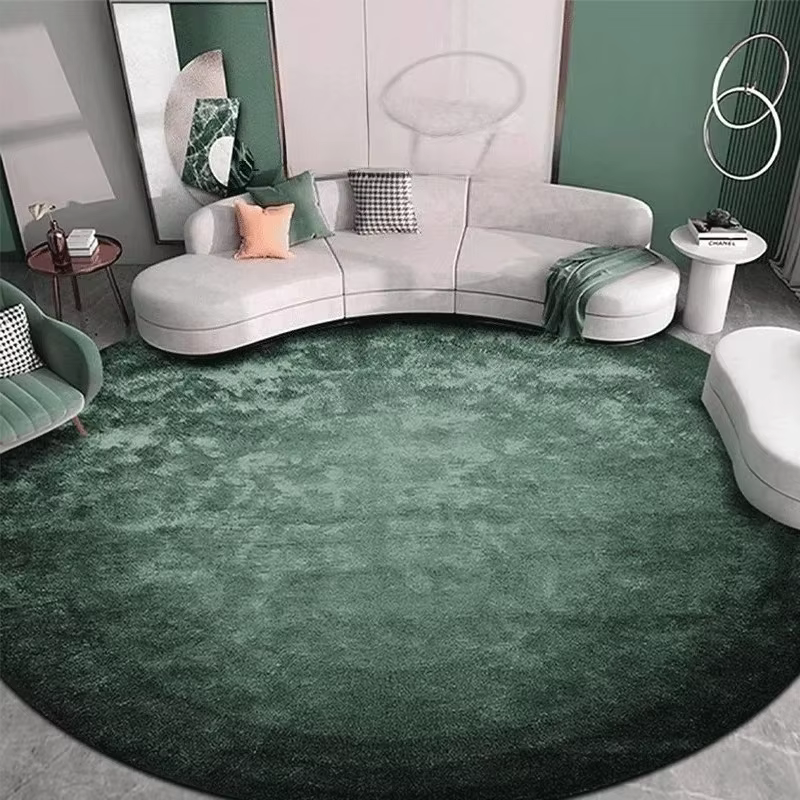 Tapis rond vert foncé de couleur unie