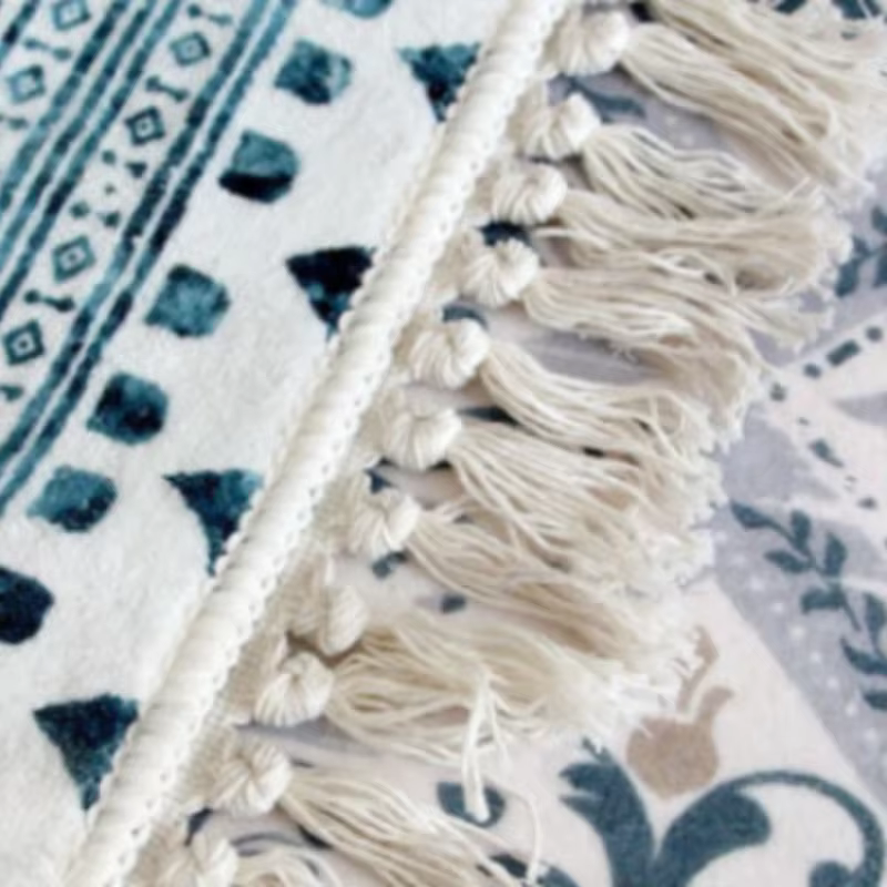 Tapis rond en peluche avec pompon pour salon