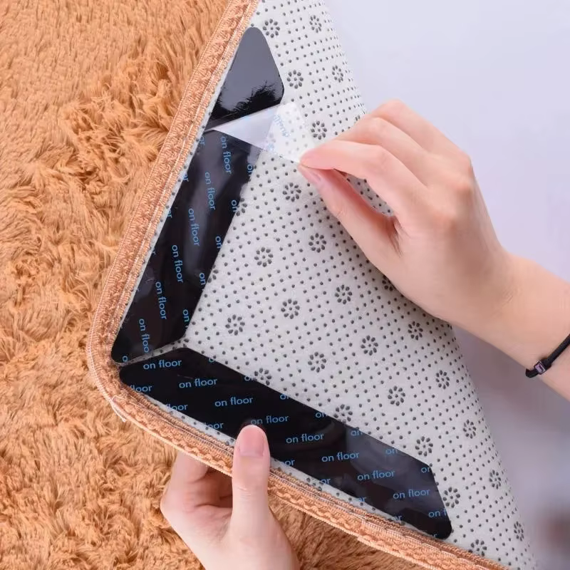 Autocollant antidérapant pour tapis
