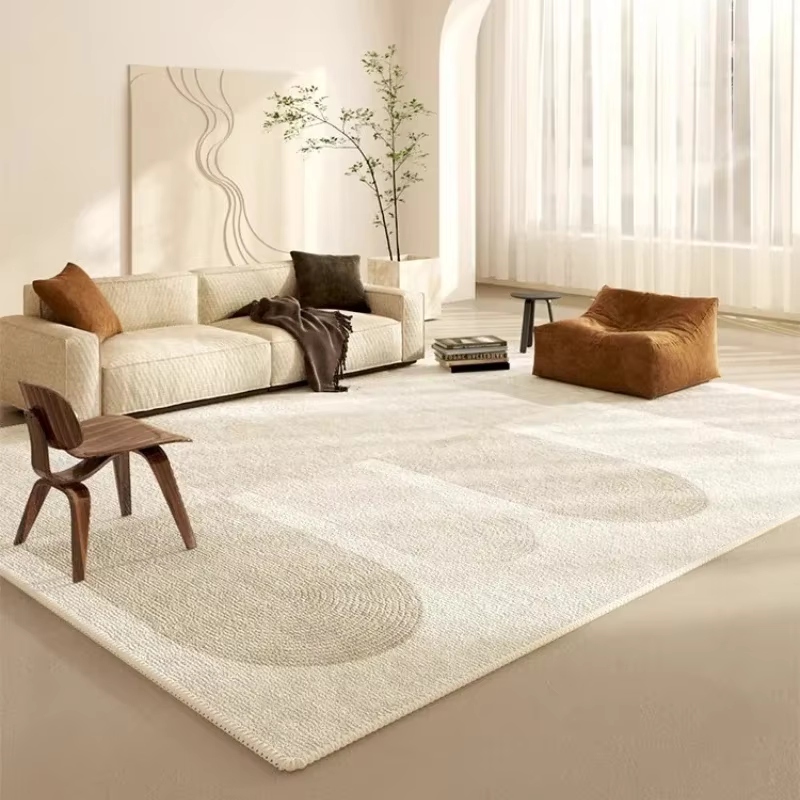 Tapis de grande surface beige à motif géométrique