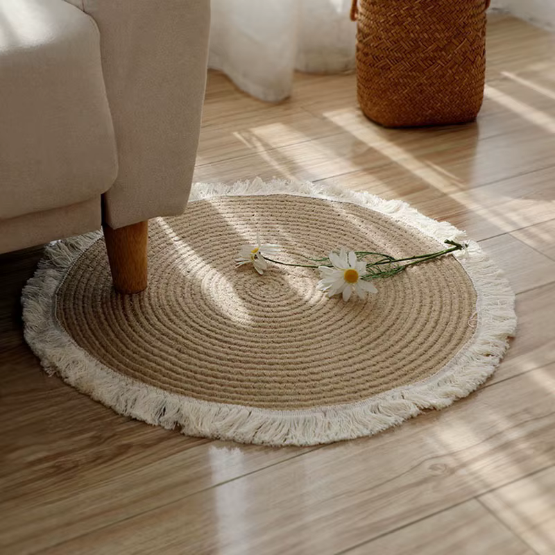 Tapis rond en rotin de jute tissé à la main avec pompon